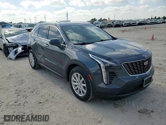 ✅ 2020 Cadillac XT4 FWD Luxury • VIN: 1GYAZAR42LF028352 • Лот: 63728465. Опубликован ранее на Copart с пробегом 100 772 миль. Бесплатный доступ к архиву аукционных продаж из США и подробный отчёт об истории автомобиля на DreamBid. Изображение 14.