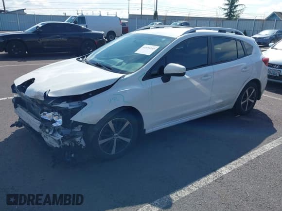 ✅ 2020 Subaru Impreza Premium • VIN: 4S3GTAV62L3704812 • Lot: 41939335. Listed on IAAI with 71,701 mi. Free auction sales archive from the USA and detailed vehicle history report at DreamBid. Image 2.