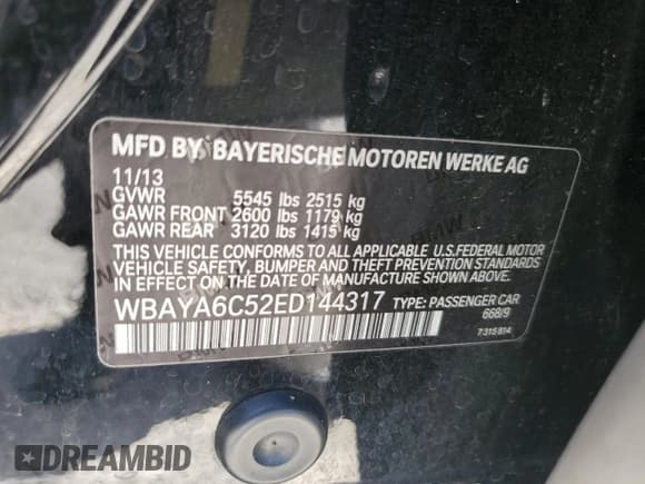 ✅ 2014 BMW 7 Series 740i • VIN: WBAYA6C52ED144317 • Lot: 87298375. Listed on Copart with 135,888 mi. Free auction sales archive from the USA and detailed vehicle history report at DreamBid. Image 13.