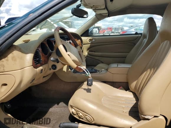 ✅ 1997 Jaguar XK • VIN: SAJGX274XVC013134 • Лот: 73891734. Опубликован ранее на Copart с пробегом Не указан. Бесплатный доступ к архиву аукционных продаж из США и подробный отчёт об истории автомобиля на DreamBid. Изображение 7.