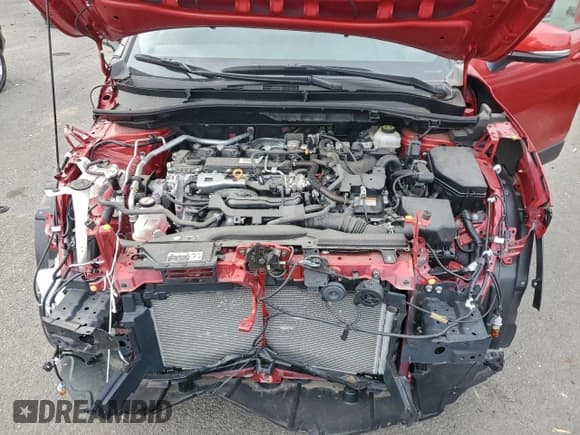 ✅ 2023 Toyota Corolla Cross Hybrid XSE • VIN: 7MUFBABG2PV015553 • Лот: 96481045. Опубликован ранее на Copart с пробегом 7 168 миль. Бесплатный доступ к архиву аукционных продаж из США и подробный отчёт об истории автомобиля на DreamBid. Изображение 11.