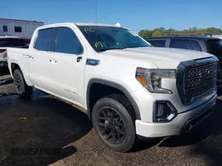 ✅ 2021 GMC Sierra 1500 Denali • VIN: 3GTU9FET8MG218895 • Лот: 43187288. Опубликован ранее на IAAI с пробегом 83 326 миль. Бесплатный доступ к архиву аукционных продаж из США и подробный отчёт об истории автомобиля на DreamBid. Изображение 1.