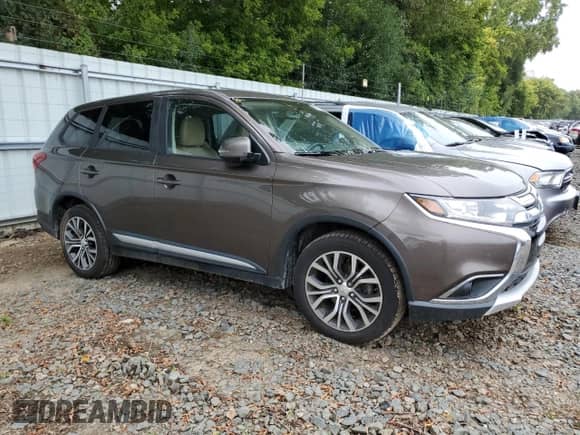 2017 Mitsubishi Outlander SE с VIN JA4AZ3A34HZ008995, выставлен на аукционе Copart как лот 71116585 с пробегом 173 939 миль миль и Списание • Salvage title. История ставок и продаж доступна на DreamBid. Изображение 4.