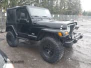 ✅ 1998 Jeep Wrangler Sahara • VIN: 1J4FY49S6WP714014 • Lot: 43531333. Listed on IAAI with 148,254 mi. Free auction sales archive from the USA and detailed vehicle history report at DreamBid. Image 1.