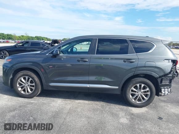 ✅ 2019 Hyundai Santa Fe SE • VIN: 5NMS23AD1KH044131 • Lot: 43237640. Wystawiony na IAAI z przebiegiem 105 619 mil. Bezpłatny archiwum sprzedaży aukcyjnych z USA i szczegółowy raport historii pojazdu na DreamBid. Zdjęcie 15.