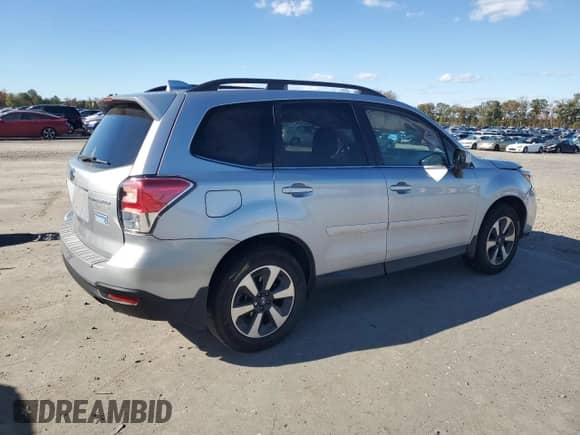 2017 Subaru Forester Limited with VIN JF2SJALC2HH407768, listed as a Copart auction lot 87364875 with 36,703 mi miles and Salvage title. Bid and sale history available at DreamBid. Image 3.