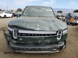 ✅ 2023 Rivian R1T Adventure • VIN: 7FCTGAAA2PN018657 • Lot: 75889434. Listed on Copart with 14,342 mi. Free auction sales archive from the USA and detailed vehicle history report at DreamBid. Image 5.