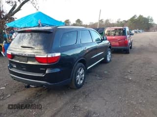 ✅ 2013 Dodge Durango Crew • VIN: 1C4SDJDT8DC653039 • Lot: 43872504. Listed on IAAI with 105,489 mi. Free auction sales archive from the USA and detailed vehicle history report at DreamBid. Image 4.