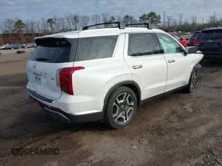 2023 Hyundai Palisade Limited z VIN KM8R5DGE9PU525669, wystawiony jako IAAI lot #41278505 z przebiegiem 156 984 mil mil oraz . Historia ofert i sprzedaży dostępna na DreamBid. Obrazek 4.