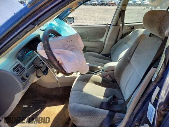 ✅ 1999 Toyota Corolla CE • VIN: 2T1BR12E9XC127455 • Lot: 81953255. Listed on Copart with 184,427 mi. Free auction sales archive from the USA and detailed vehicle history report at DreamBid. Image 7.