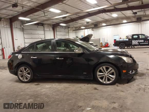 2012 Chevrolet Cruze LTZ с VIN 1G1PH5SC4C7158566, выставлен на аукционе IAAI как лот 43390104 с пробегом 146 750 миль миль и . История ставок и продаж доступна на DreamBid. Изображение 14.