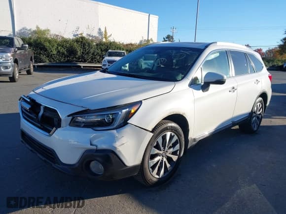 ✅ 2018 Subaru Outback Touring • VIN: 4S4BSATC5J3352775 • Lot: 43673950. Listed on IAAI with 84,097 mi. Free auction sales archive from the USA and detailed vehicle history report at DreamBid. Image 2.