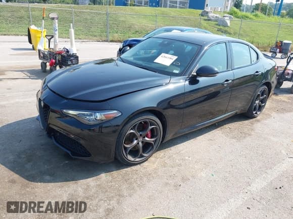 ✅ 2017 Alfa Romeo Giulia Ti • VIN: ZARFAEEN9H7562237 • Lot: 42843384. Listed on IAAI with 51,682 mi. Free auction sales archive from the USA and detailed vehicle history report at DreamBid. Image 2.