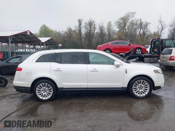 ✅ 2012 Lincoln MKT EcoBoost • VIN: 2LMHJ5AT6CBL50239 • Лот: 41923179. Опубликован ранее на IAAI с пробегом 215 418 миль. Бесплатный доступ к архиву аукционных продаж из США и подробный отчёт об истории автомобиля на DreamBid. Изображение 12.
