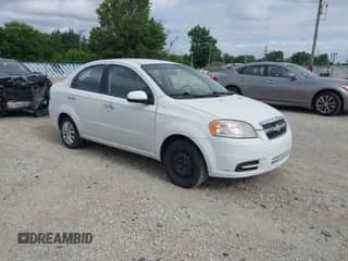 2011 Chevrolet Aveo 1LT z VIN KL1TD5DE6BB255979, wystawiony jako IAAI lot #42771013 z przebiegiem 128 636 mil mil oraz . Historia ofert i sprzedaży dostępna na DreamBid. Obrazek 1.