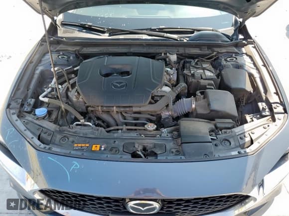 ✅ 2023 Mazda 3 S Carbon Edition • VIN: 3MZBPBCM4PM360097 • Лот: 72000575. Опубликован ранее на Copart с пробегом 54 511 миль. Бесплатный доступ к архиву аукционных продаж из США и подробный отчёт об истории автомобиля на DreamBid. Изображение 11.