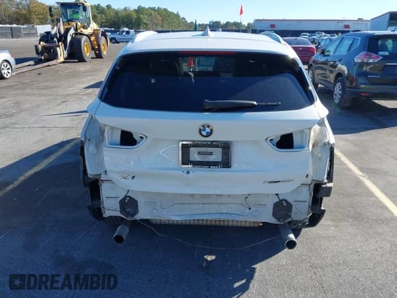 ✅ 2018 BMW X1 xDrive28i • VIN: WBXHT3C38J3H30018 • Lot: 43694942. Listed on IAAI with 50,899 mi. Free auction sales archive from the USA and detailed vehicle history report at DreamBid. Image 16.