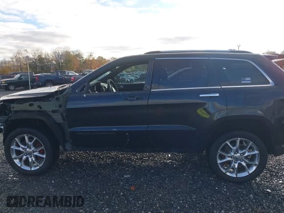 ✅ 2014 Jeep Grand Cherokee Summit • VIN: 1C4RJFJT6EC389037 • Lot: 43547372. Listed on IAAI with 152,933 mi. Free auction sales archive from the USA and detailed vehicle history report at DreamBid. Image 15.