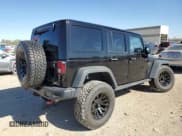 ✅ 2016 Jeep Wrangler Unlimited Rubicon • VIN: 1C4BJWFG0GL344398 • Lot: 87245225. Listed on Copart with 64,981 mi. Free auction sales archive from the USA and detailed vehicle history report at DreamBid. Image 3.