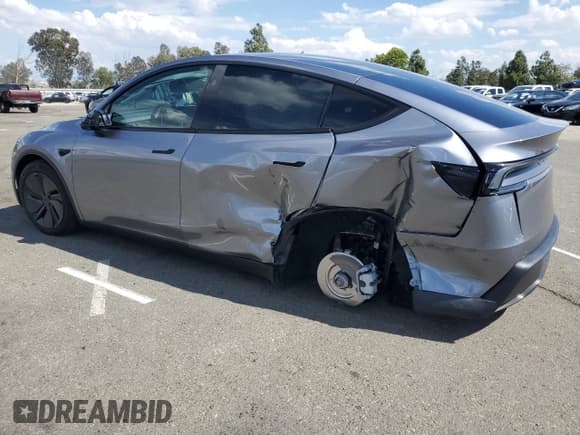 ✅ 2026 Tesla Model Y Long Range • VIN: 7SAYGDED8TF427808 • Lot: 81492525. Listed on Copart with 1,637 mi. Free auction sales archive from the USA and detailed vehicle history report at DreamBid. Image 2.