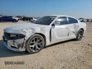 ✅ 2015 Dodge Charger SXT • VIN: 2C3CDXHGXFH900084 • Lot: 85196155. Listed on Copart with 195,422 mi. Free auction sales archive from the USA and detailed vehicle history report at DreamBid. Image 1.
