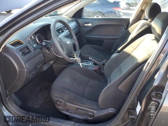 ✅ 2007 Ford Fusion SE • VIN: 3FAHP07117R238629 • Lot: 82776535. Listed on Copart with 144,225 mi. Free auction sales archive from the USA and detailed vehicle history report at DreamBid. Image 7.