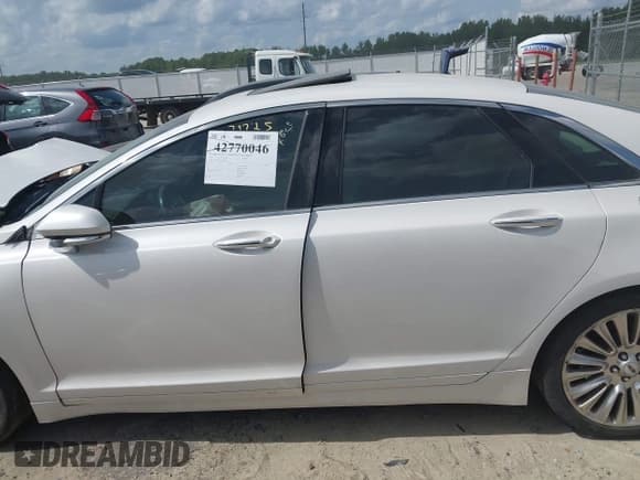 ✅ 2013 Lincoln MKZ • VIN: 3LN6L2G97DR805335 • Лот: 42770046. Опубликован ранее на IAAI с пробегом Не указан. Бесплатный доступ к архиву аукционных продаж из США и подробный отчёт об истории автомобиля на DreamBid. Изображение 14.