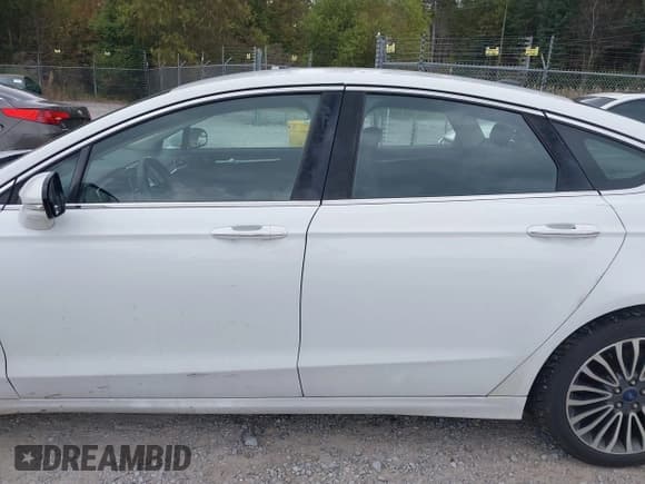✅ 2017 Ford Fusion Titanium • VIN: 3FA6P0K91HR316669 • Lot: 43609374. Listed on IAAI with 139,308 mi. Free auction sales archive from the USA and detailed vehicle history report at DreamBid. Image 15.