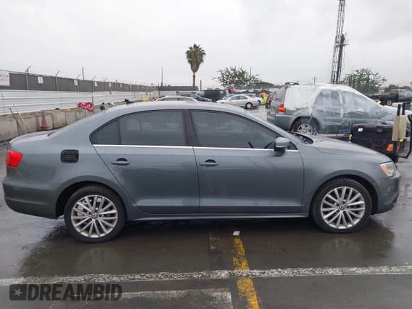 ✅ 2013 Volkswagen Jetta SEL • VIN: 3VWLP7AJ2DM440911 • Lot: 43678280. Listed on IAAI with 133,618 mi. Free auction sales archive from the USA and detailed vehicle history report at DreamBid. Image 13.