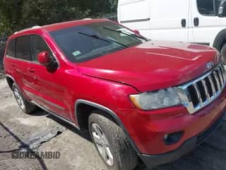 2011 Jeep Grand Cherokee Laredo z VIN 1J4RR4GG7BC574548, wystawiony jako IAAI lot #43076156 z przebiegiem 206 558 mil mil oraz . Historia ofert i sprzedaży dostępna na DreamBid. Obrazek 1.