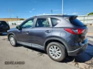 ✅ 2016 Mazda CX-5 Touring • VIN: JM3KE4CY6G0662637 • Lot: 80868985. Wystawiony na Copart z przebiegiem 83 661 mil. Bezpłatny archiwum sprzedaży aukcyjnych z USA i szczegółowy raport historii pojazdu na DreamBid. Zdjęcie 2.