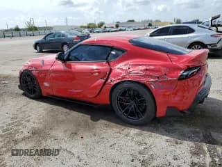 ✅ 2020 Toyota Supra 3.0 • VIN: WZ1DB4C09LW026422 • Лот: 65438704. Опубликован ранее на Copart с пробегом 58 505 миль. Бесплатный доступ к архиву аукционных продаж из США и подробный отчёт об истории автомобиля на DreamBid. Изображение 2.