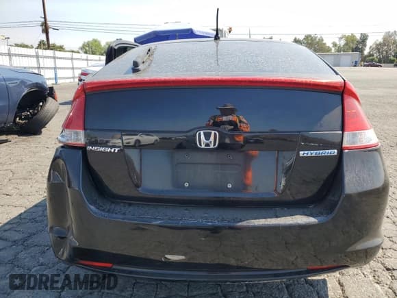 ✅ 2010 Honda Insight EX • VIN: JHMZE2H78AS015498 • Лот: 71292474. Опубликован ранее на Copart с пробегом 233 287 миль. Бесплатный доступ к архиву аукционных продаж из США и подробный отчёт об истории автомобиля на DreamBid. Изображение 6.