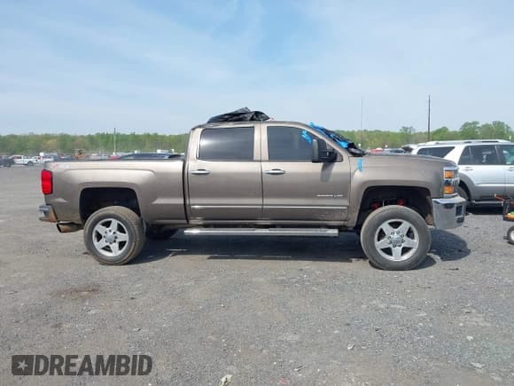 ✅ 2015 Chevrolet Silverado 2500HD LTZ • VIN: 1GC1KWE89FF183873 • Lot: 42114681. Listed on IAAI with 113,443 mi. Free auction sales archive from the USA and detailed vehicle history report at DreamBid. Image 13.