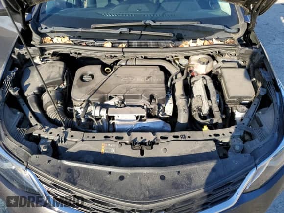 2017 Chevrolet Cruze LT z VIN 1G1BE5SM5H7255097, wystawiony jako Copart lot #69634542 z przebiegiem 29 089 mil mil oraz . Historia ofert i sprzedaży dostępna na DreamBid. Obrazek 13.