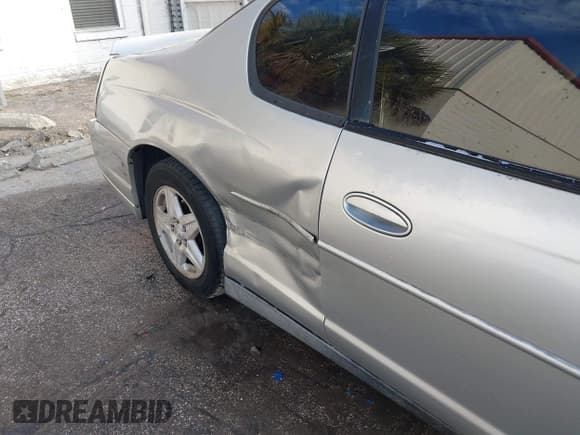 ✅ 2004 Chevrolet Monte Carlo LS • VIN: 2G1WW12E749392499 • Lot: 43635904. Listed on IAAI with 265,352 mi. Free auction sales archive from the USA and detailed vehicle history report at DreamBid. Image 13.