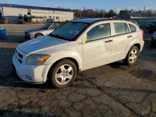 ✅ 2010 Dodge Caliber • VIN: 1B3CB1HA6AD598116 • Лот: 77968864. Опубликован ранее на Copart с пробегом 163 884 миль. Бесплатный доступ к архиву аукционных продаж из США и подробный отчёт об истории автомобиля на DreamBid. Изображение 1.