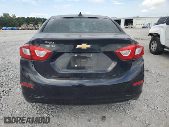 ✅ 2019 Chevrolet Cruze LS • VIN: 1G1BC5SM5K7125429 • Lot: 82071315. Listed on Copart with 41,550 mi. Free auction sales archive from the USA and detailed vehicle history report at DreamBid. Image 6.