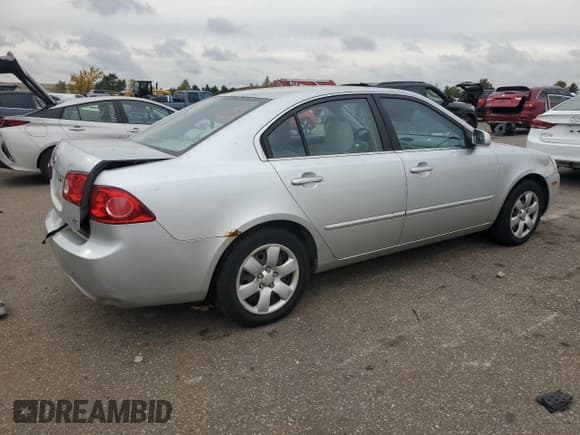 ✅ 2007 Kia Optima LX • VIN: KNAGE123375135870 • Лот: 90048305. Опубликован ранее на Copart с пробегом 213 245 миль. Бесплатный доступ к архиву аукционных продаж из США и подробный отчёт об истории автомобиля на DreamBid. Изображение 3.