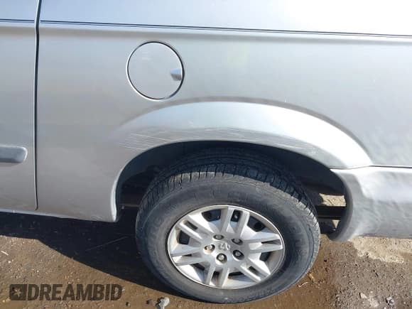 ✅ 2006 Dodge Grand Caravan SE • VIN: 1D4GP24R06B650297 • Lot: 43616934. Wystawiony na IAAI z przebiegiem 70 494 mil. Bezpłatny archiwum sprzedaży aukcyjnych z USA i szczegółowy raport historii pojazdu na DreamBid. Zdjęcie 6.