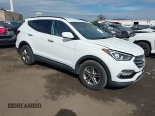 ✅ 2017 Hyundai Santa Fe 2.4L • VIN: 5XYZUDLB2HG401538 • Лот: 43465402. Опубликован ранее на IAAI с пробегом 169 582 миль. Бесплатный доступ к архиву аукционных продаж из США и подробный отчёт об истории автомобиля на DreamBid. Изображение 1.