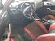 2013 Hyundai Veloster w/Gray Int с VIN KMHTC6AD9DU171140, выставлен на аукционе Copart как лот 71299174 с пробегом 100 755 миль миль и Списание • Salvage title. История ставок и продаж доступна на DreamBid. Изображение 8.