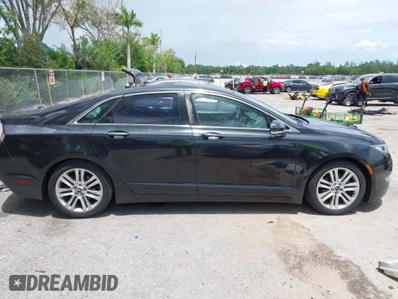 ✅ 2015 Lincoln MKZ Hybrid • VIN: 3LN6L2LU5FR624389 • Lot: 42750207. Listed on IAAI with 103,233 mi. Free auction sales archive from the USA and detailed vehicle history report at DreamBid. Image 13.