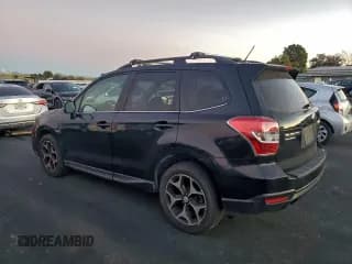 ✅ 2014 Subaru Forester XT Touring • VIN: JF2SJGMC6EH492093 • Лот: 93976195. Опубликован ранее на Copart с пробегом 163 401 миль. Бесплатный доступ к архиву аукционных продаж из США и подробный отчёт об истории автомобиля на DreamBid. Изображение 2.