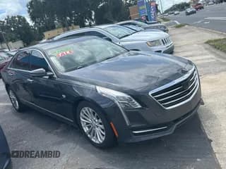 ✅ 2016 Cadillac CT6 RWD • VIN: 1G6KA5RX8GU166968 • Lot: 71901815. Wystawiony na Copart z przebiegiem 121 047 mil. Bezpłatny archiwum sprzedaży aukcyjnych z USA i szczegółowy raport historii pojazdu na DreamBid. Zdjęcie 1.