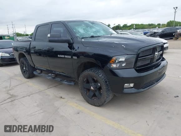 ✅ 2012 Ram 1500 Sport • VIN: 1C6RD7MT2CS186522 • Lot: 42006098. Listed on IAAI with 158,618 mi. Free auction sales archive from the USA and detailed vehicle history report at DreamBid. Image 1.