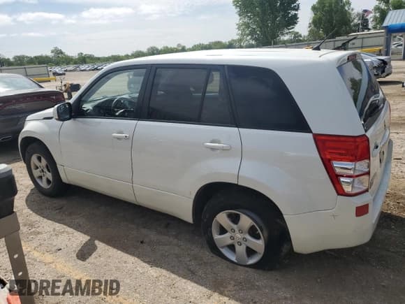 ✅ 2013 Suzuki Grand Vitara Premium • VIN: JS3TE0D62D4100310 • Lot: 54916065. Listed on Copart with 116,428 mi. Free auction sales archive from the USA and detailed vehicle history report at DreamBid. Image 2.