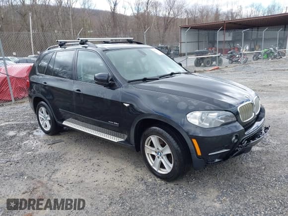 ✅ 2012 BMW X5 35d • VIN: 5UXZW0C59CL666269 • Lot: 41766000. Listed on IAAI with 181,794 mi. Free auction sales archive from the USA and detailed vehicle history report at DreamBid. Image 1.