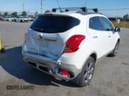 ✅ 2014 Buick Encore Leather • VIN: KL4CJGSB8EB711114 • Lot: 42453277. Wystawiony na IAAI z przebiegiem 138 545 mil. Bezpłatny archiwum sprzedaży aukcyjnych z USA i szczegółowy raport historii pojazdu na DreamBid. Zdjęcie 4.