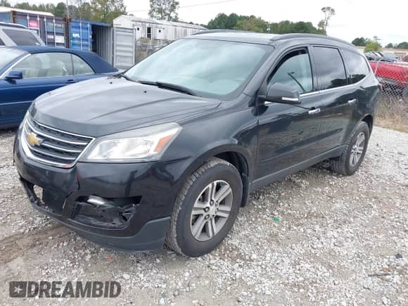 2015 Chevrolet Traverse LT z VIN 1GNKRHKD1FJ167104, wystawiony jako IAAI lot #43436822 z przebiegiem 187 639 mil mil oraz . Historia ofert i sprzedaży dostępna na DreamBid. Obrazek 2.